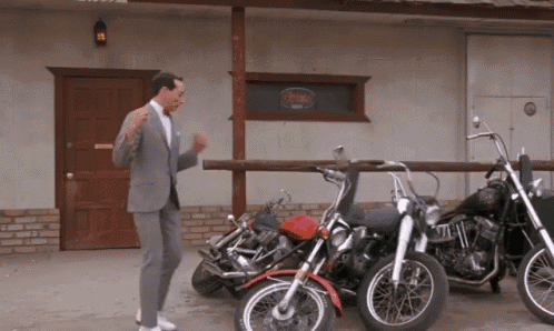 Pee-wee knocking over motorcycle